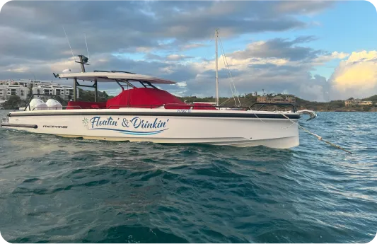 A boat with the name Floatin and Drinkin